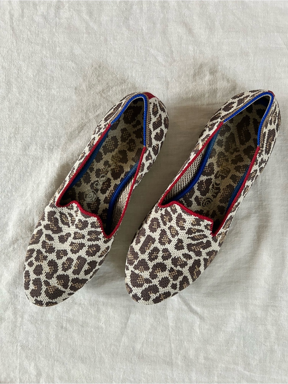Rothy's Leopard-Print Slip-On Flats with Red and Blue Trim
